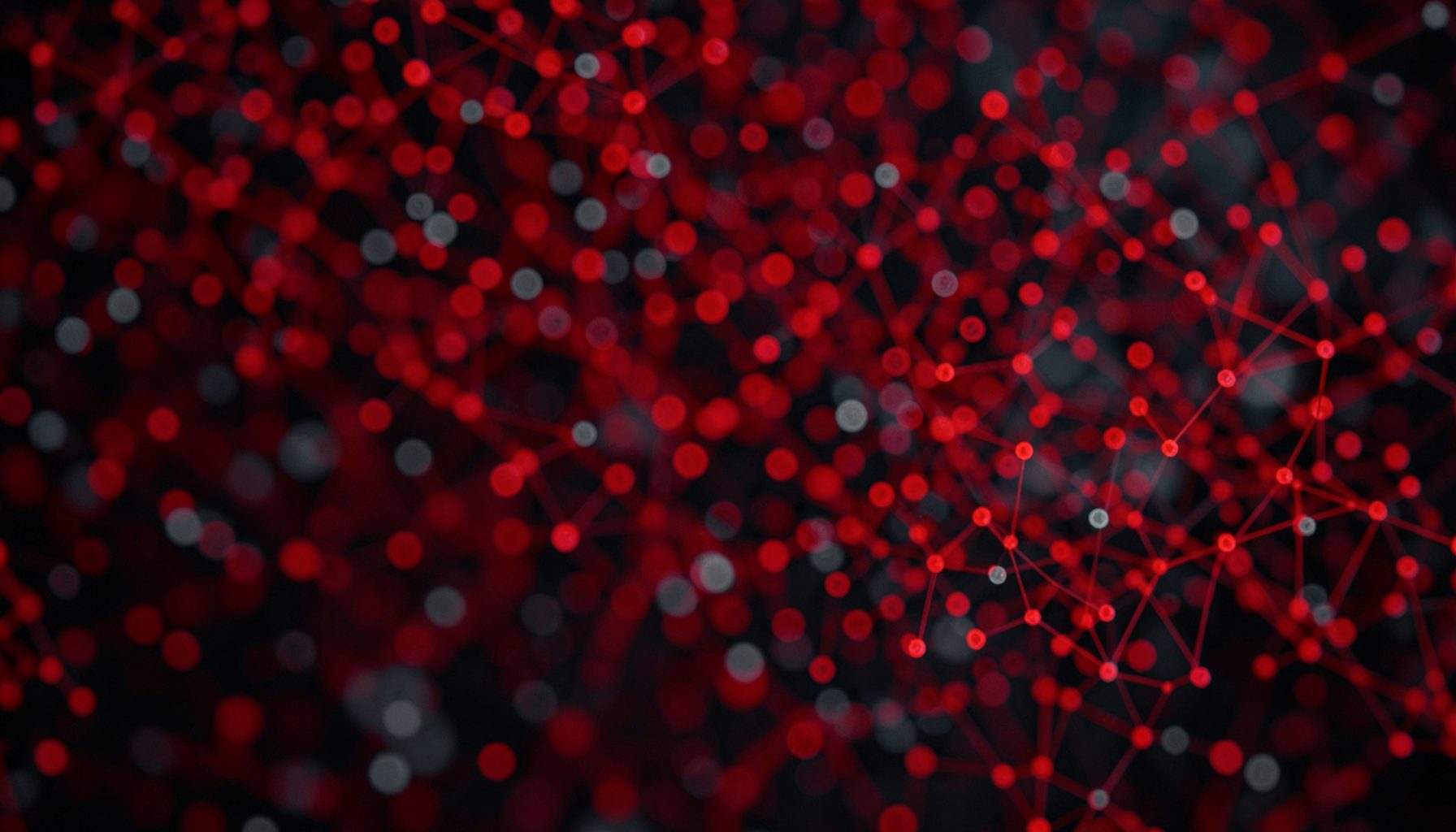 Abstract blurred pattern of data points and network nodes in deep red and dark gray tones, conveying public health monitoring